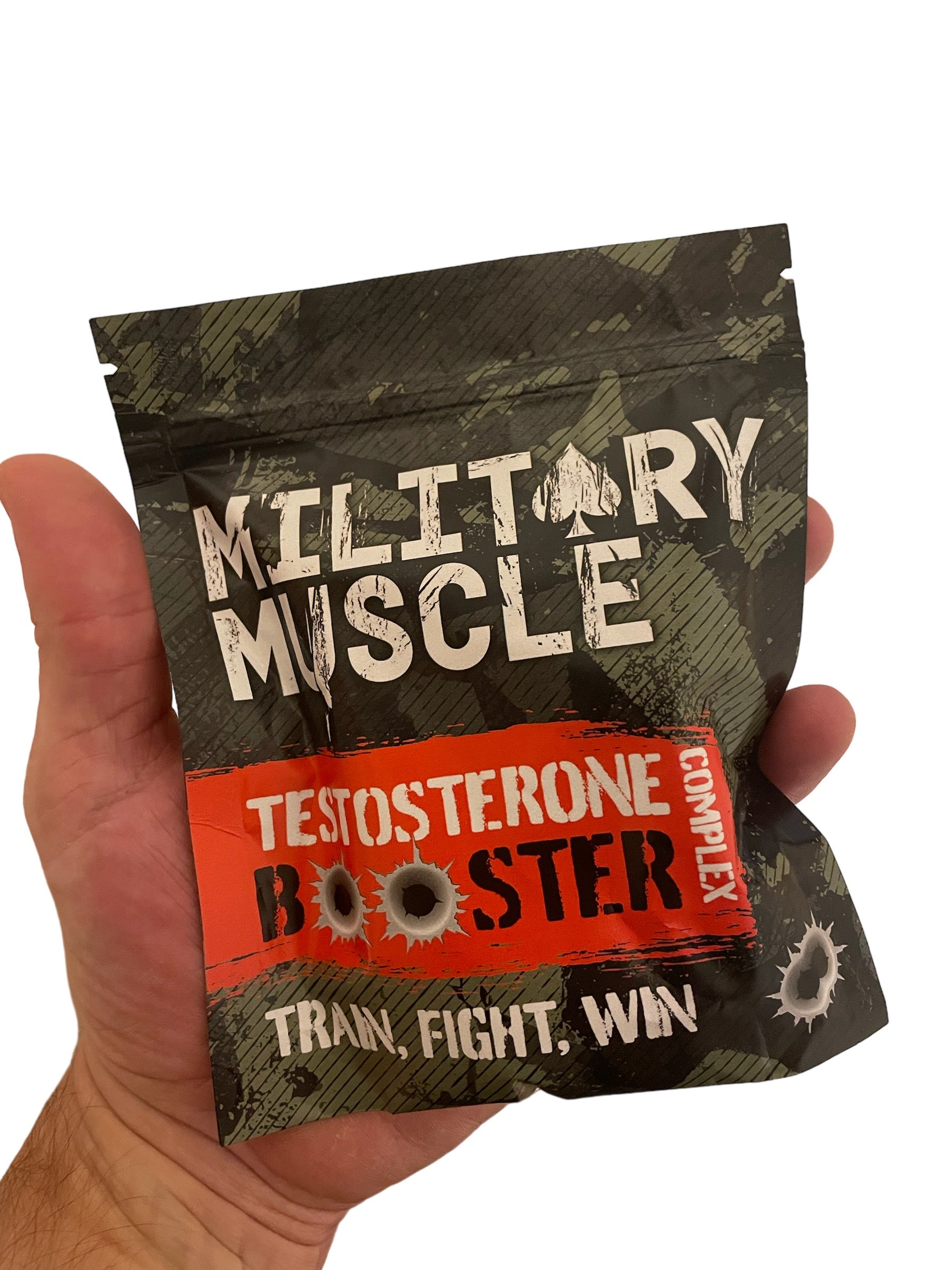 a packet of military muscle testosterone booster being held in a hand